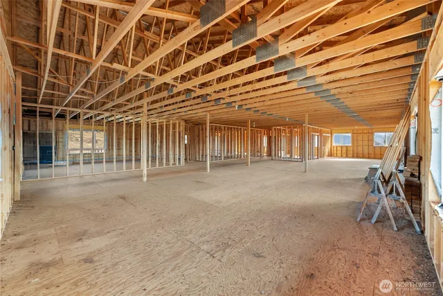 a bedroom with furniture and a chandelier
