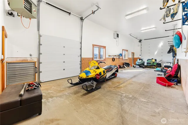 a room with furniture and white walls