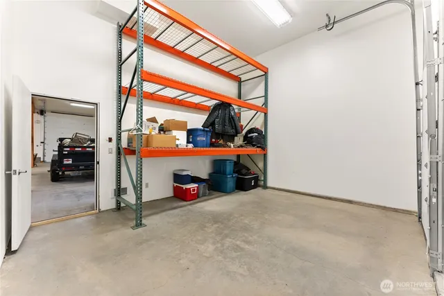 swimming pool view with a lake view in back
