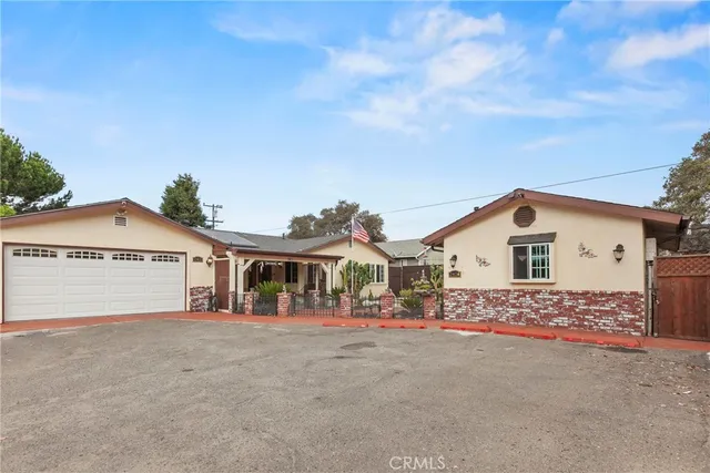 a view of house with a outdoor space