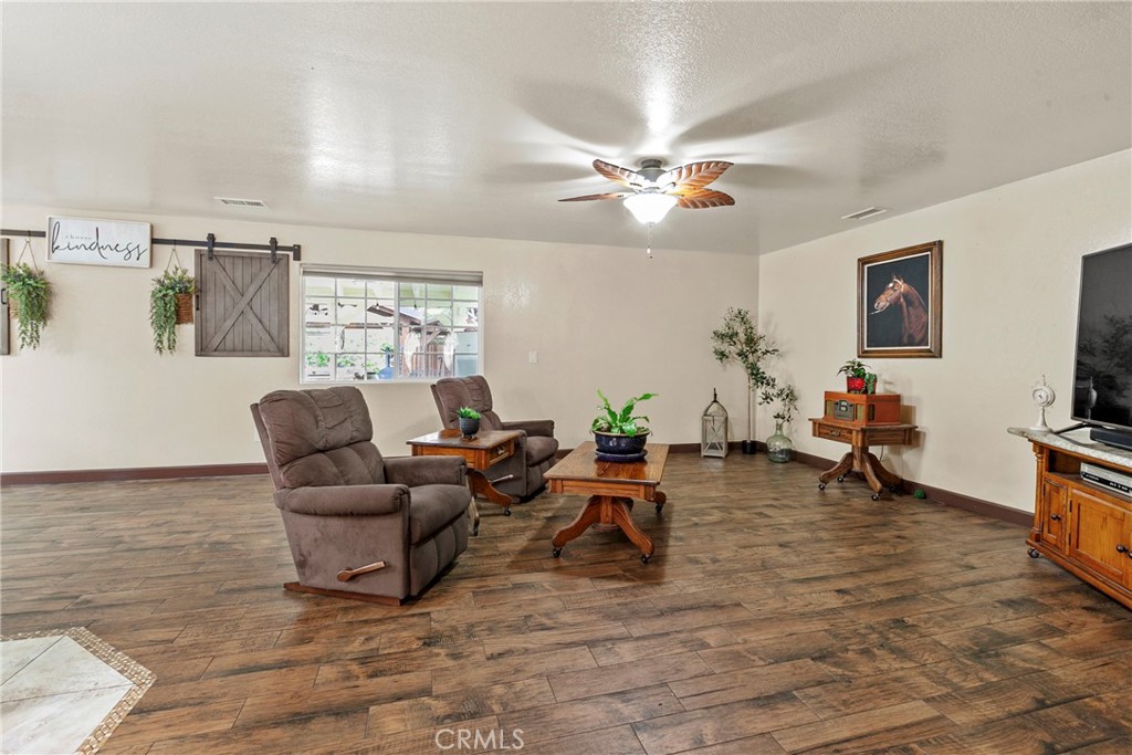 245 Walnut Street Arroyo Grande, CA 93420 - Photo 4 of 34 a living room with furniture and a flat screen tv