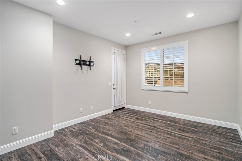 41908 Sonoma Road Palmdale, CA 93551 - Photo 34 of 75 wooden floor in an empty room with a window