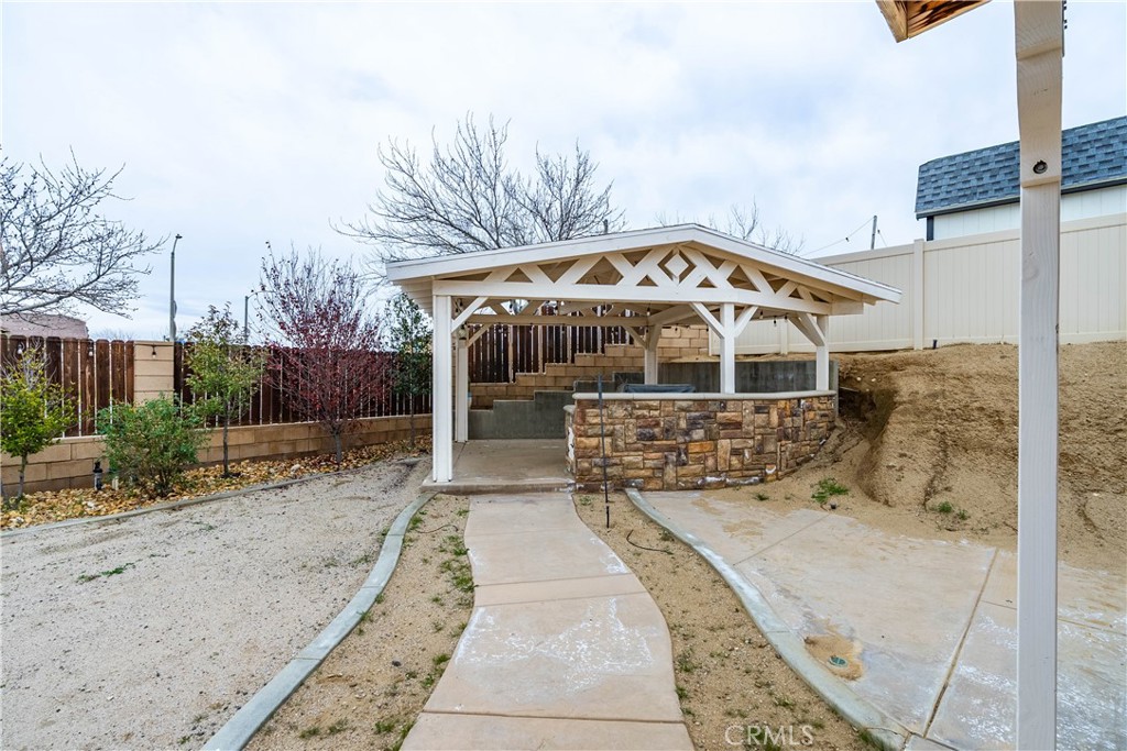 41908 Sonoma Road Palmdale, CA 93551 - Photo 58 of 75 a front view of a house with a yard
