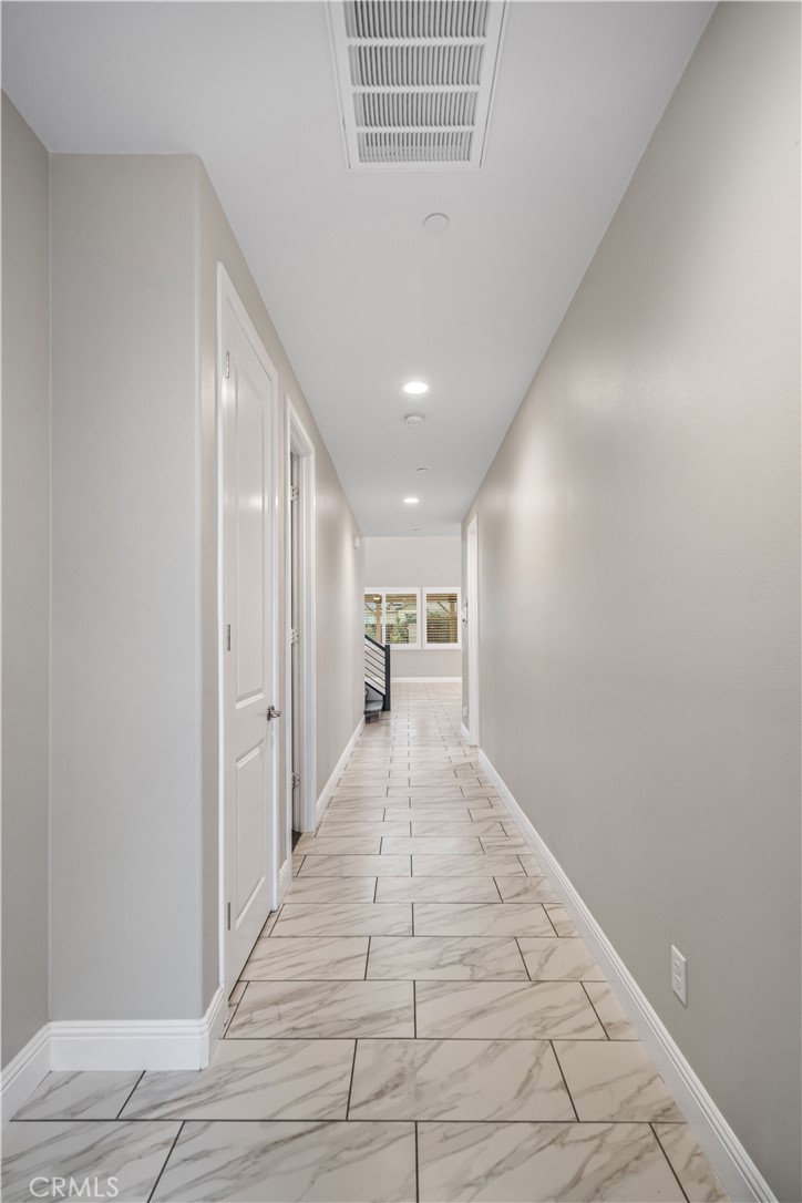 41908 Sonoma Road Palmdale, CA 93551 - Photo 7 of 75 a view of a hallway with a window
