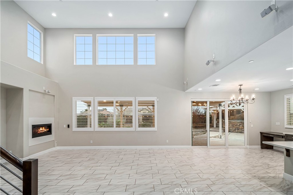 41908 Sonoma Road Palmdale, CA 93551 - Photo 8 of 75 a view of an empty room with a window