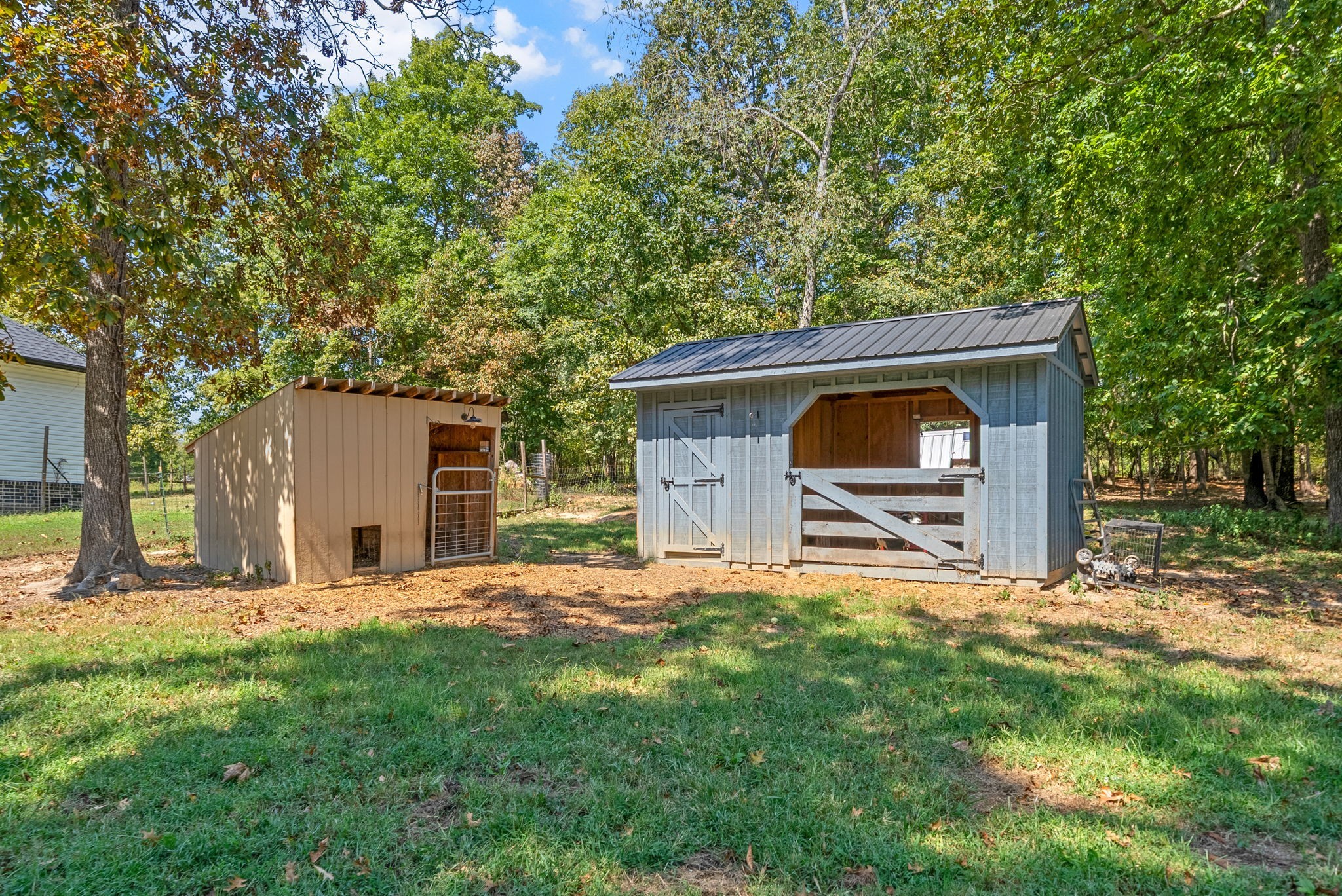 1663 Southside Road Southside, TN 37171 - Photo 46 of 59 a backyard of a house with table and chairs