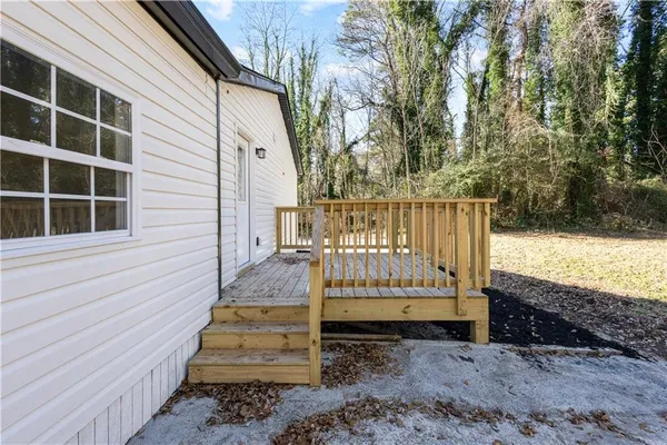 a view of stairs and wooden fence