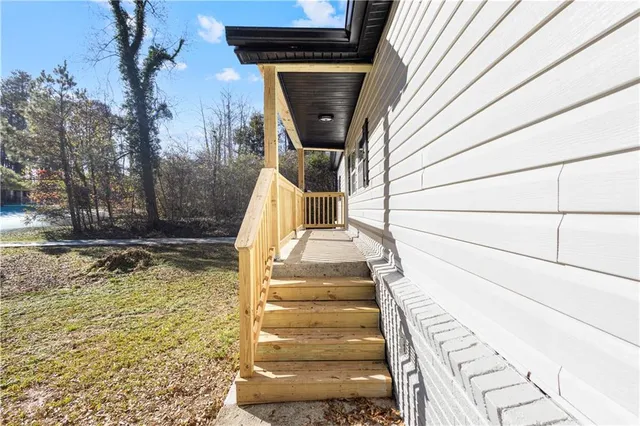 a view of entryway with wooden floor