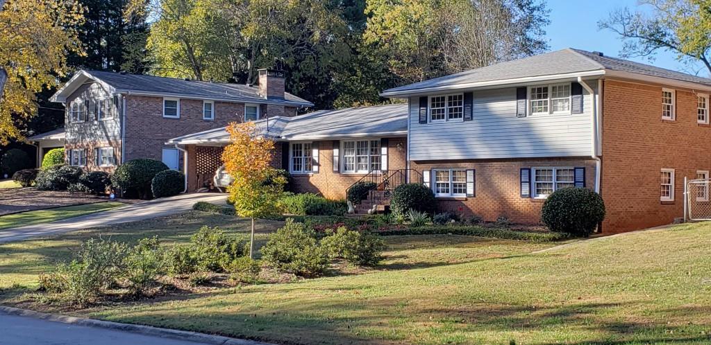 2908 Country Squire Lane Decatur, GA 30033 - Photo 1 of 1 a front view of a house with a yard