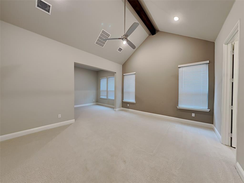 8262 Ottowa Ridge Frisco, TX 75034 - Photo 7 of 24 an empty room with a ceiling fan and window