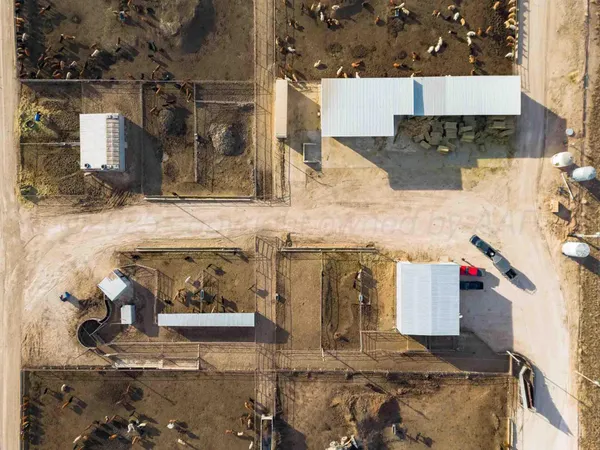 an aerial view of a building with beach