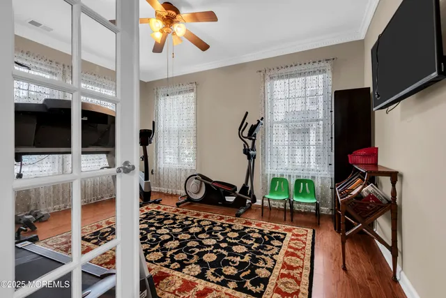a bedroom with furniture and a window