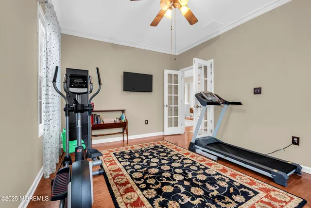 a bedroom with furniture and a window