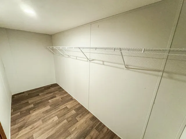 a view of a room with racks on the wall