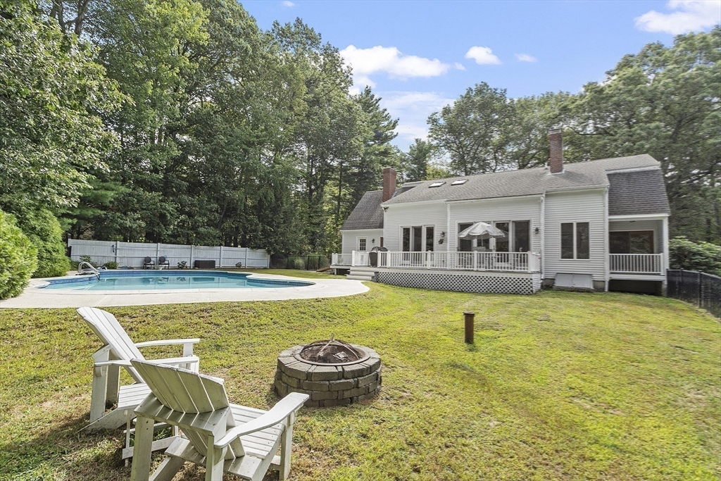 22 Kettle Hole Road Bolton, MA 01740 - Photo 38 of 42 a view of a house with swimming pool and sitting area