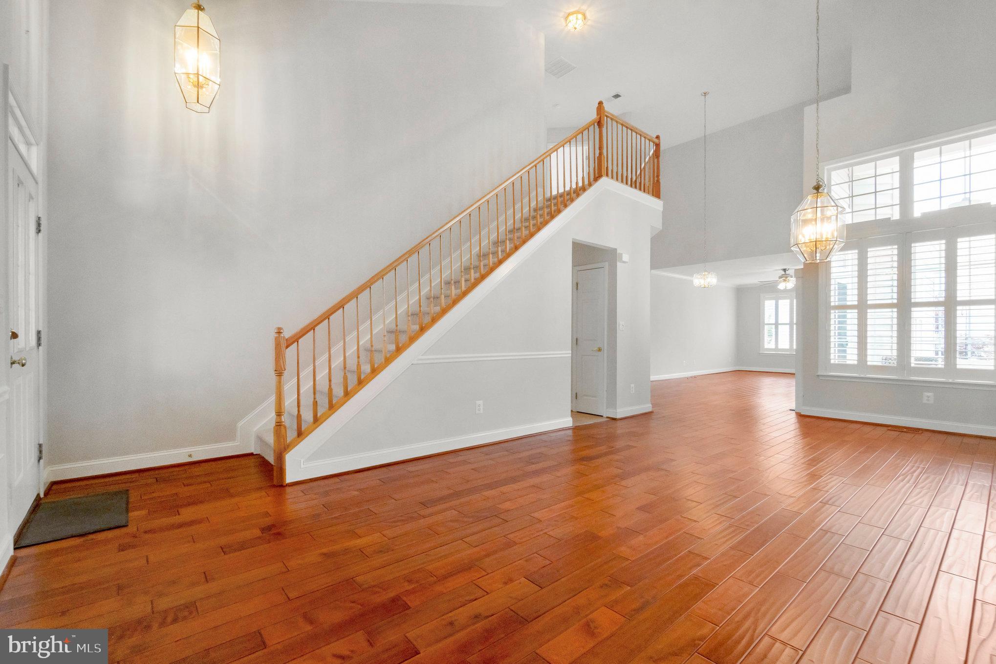 13428 Fieldstone Way Gainesville, VA 20155 - Photo 15 of 46 a view of an entryway with wooden floor