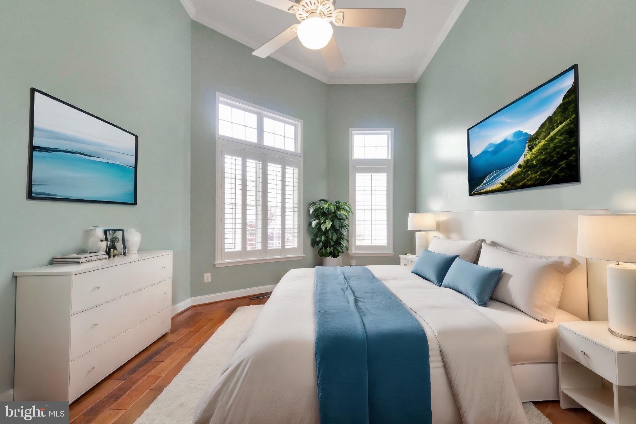 13428 Fieldstone Way Gainesville, VA 20155 - Photo 20 of 46 a bedroom with a bed and a chandelier