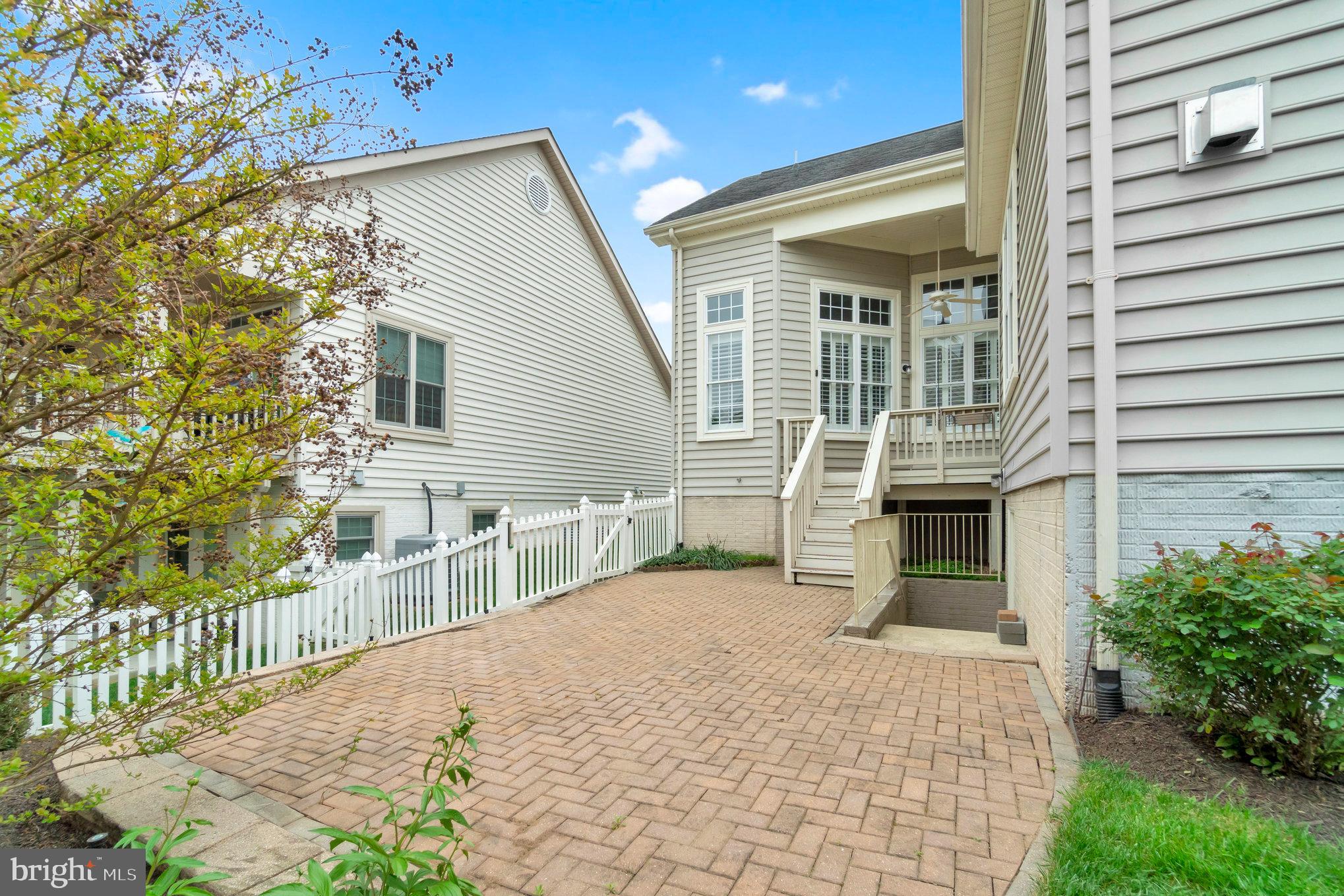 13428 Fieldstone Way Gainesville, VA 20155 - Photo 6 of 46 a front view of a house with a porch
