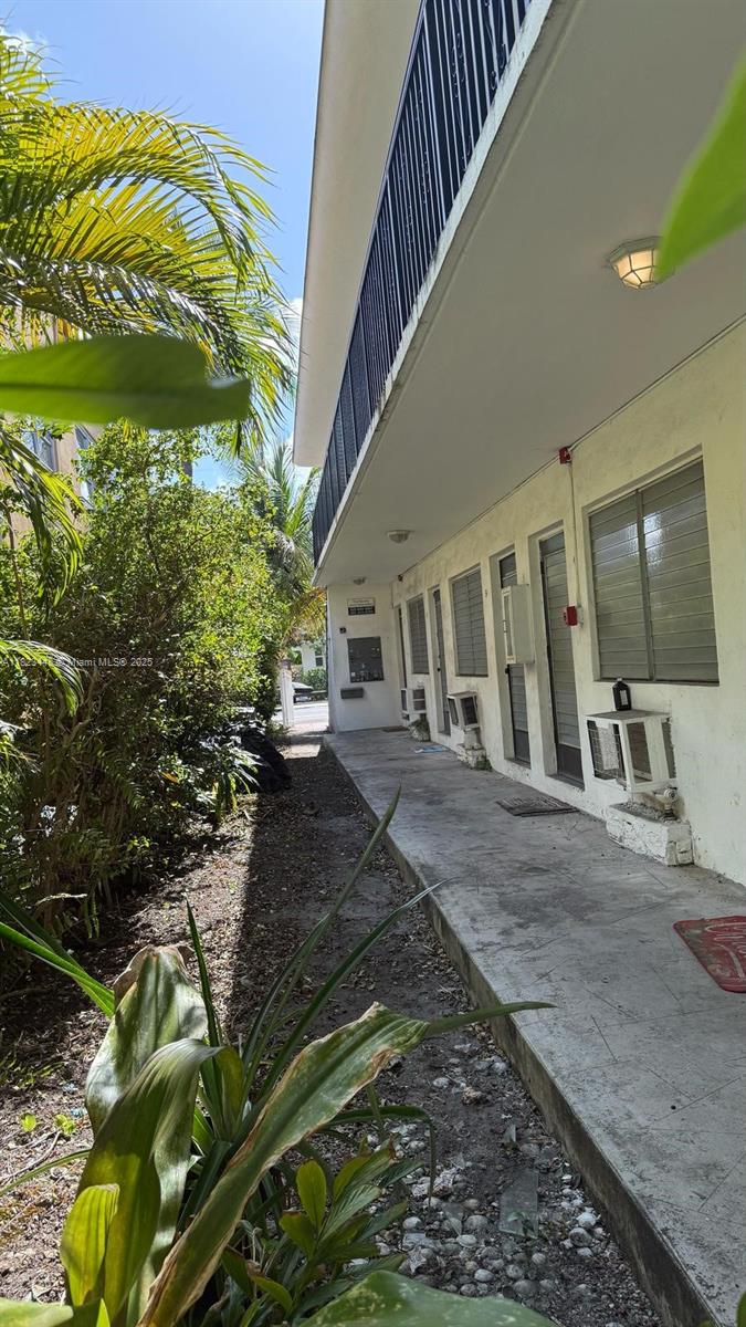 8132 Harding Avenue, Unit 2 Miami Beach, FL 33141 - Photo 19 of 20 a view of a house with a yard