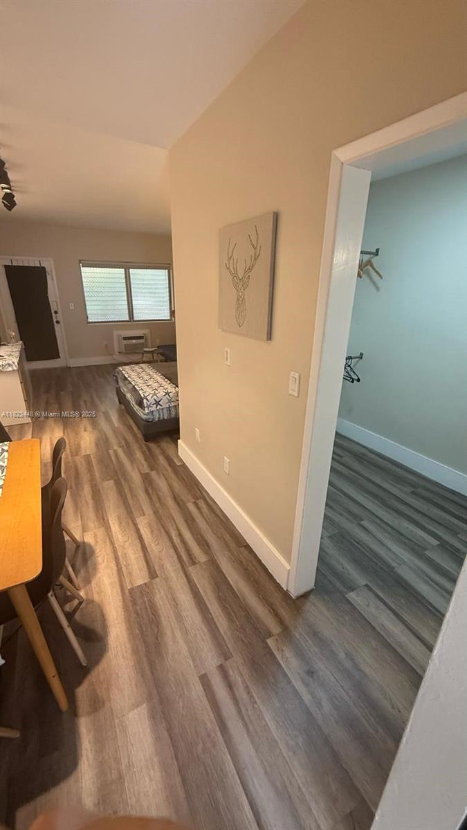 8132 Harding Avenue, Unit 2 Miami Beach, FL 33141 - Photo 9 of 20 a view of a livingroom with wooden floor