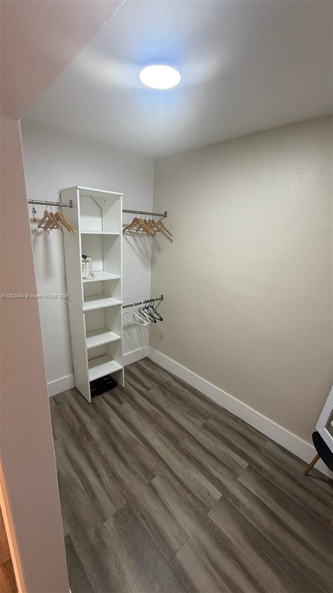 8132 Harding Avenue, Unit 2 Miami Beach, FL 33141 - Photo 10 of 20 a view of walk in closet with empty racks
