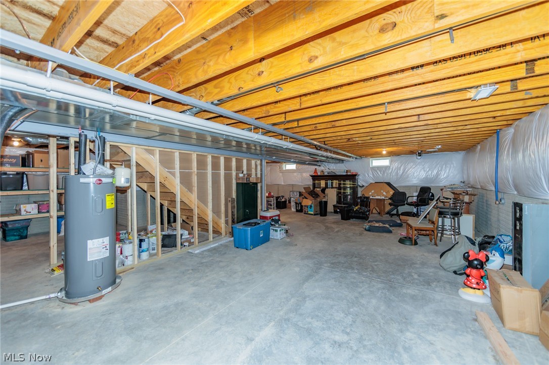 12709 Chamberlain Road Aurora, OH 44202 - Photo 27 of 34 Basement featuring water heater