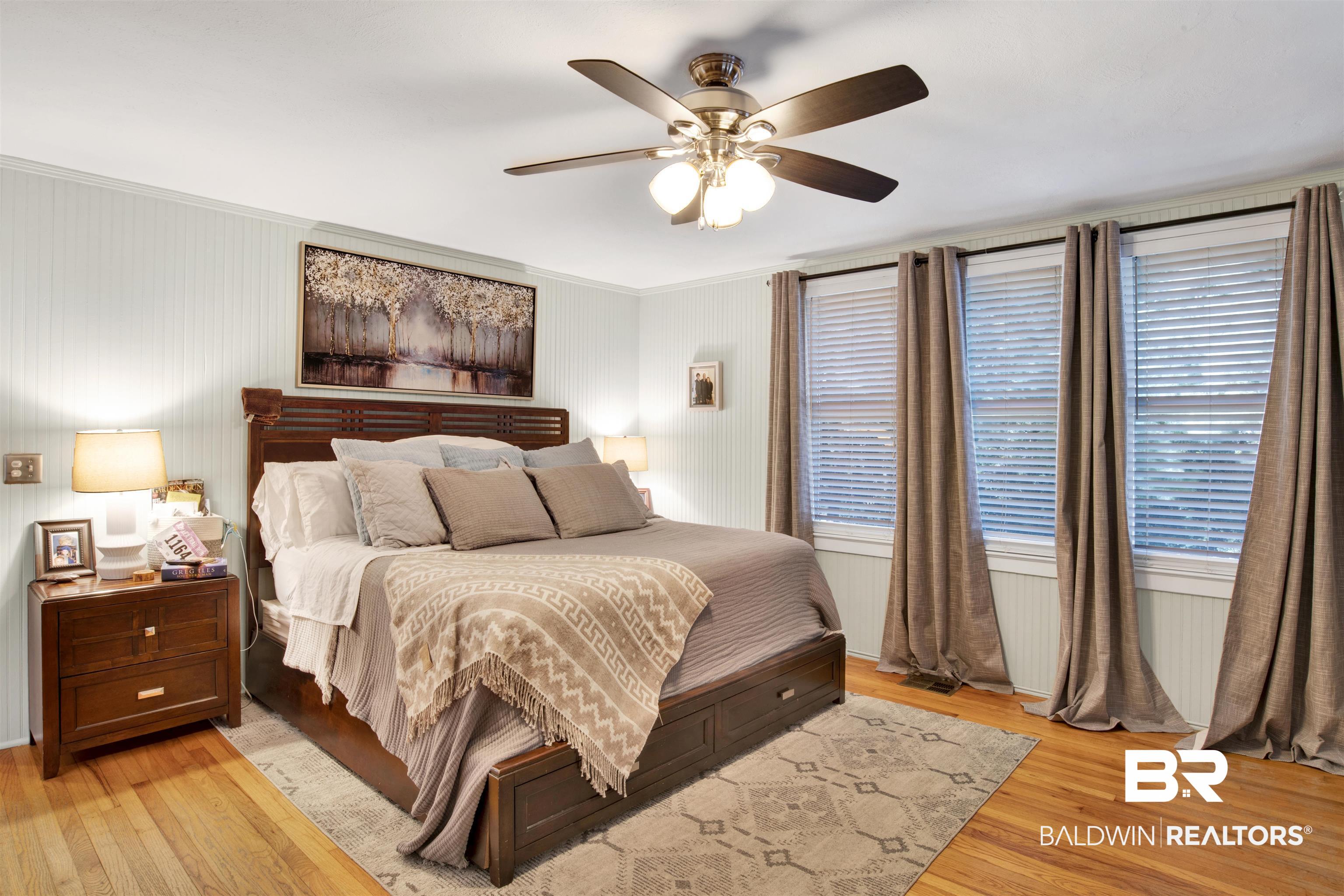 605 Van Avenue Daphne, AL 36526 - Photo 20 of 37 Bedroom with crown molding, light wood-type flooring, and ceiling fan