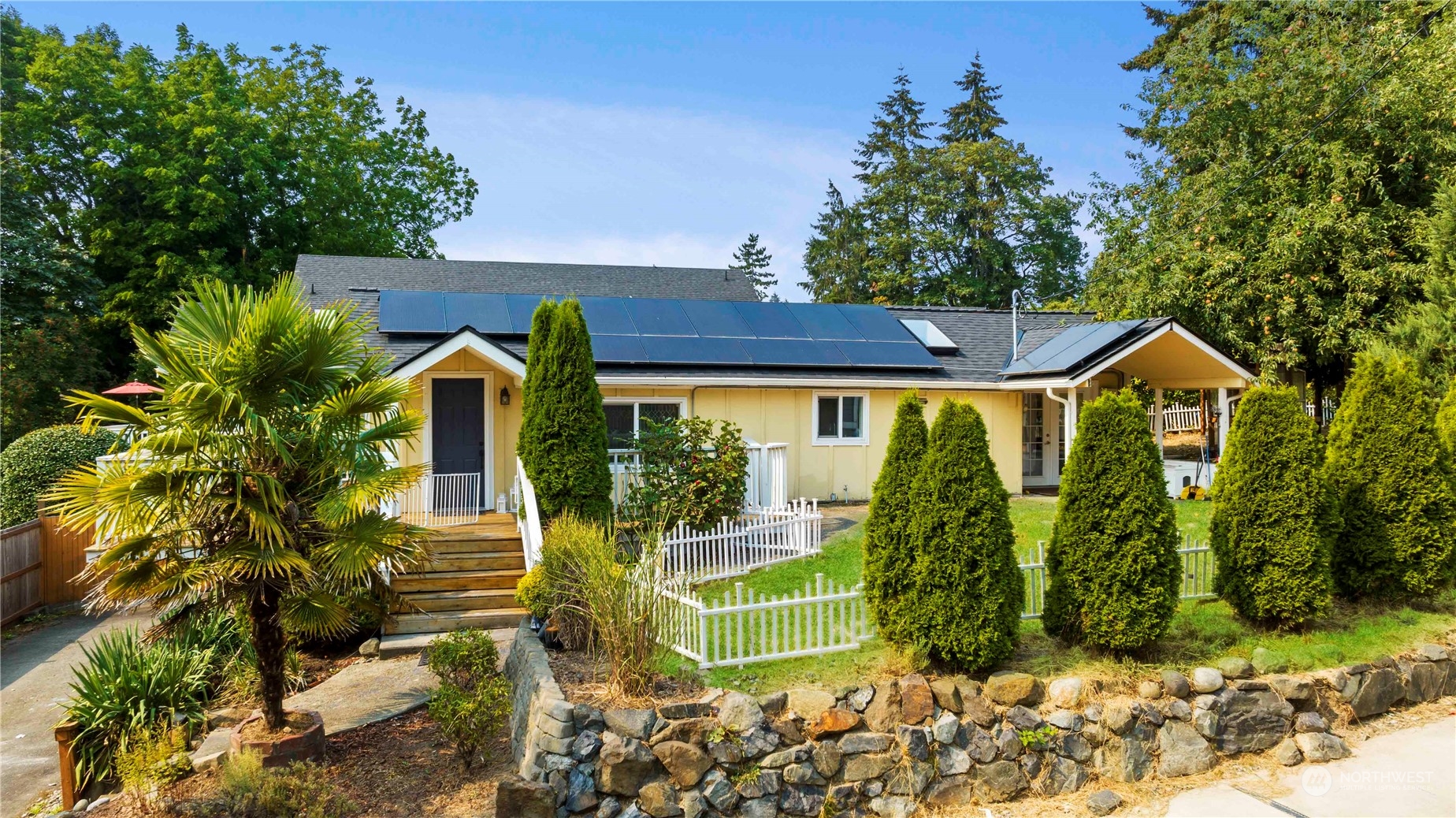 313 Earlington Avenue Southwest Renton, WA 98057 - Photo 1 of 35 a view of front of house with a yard