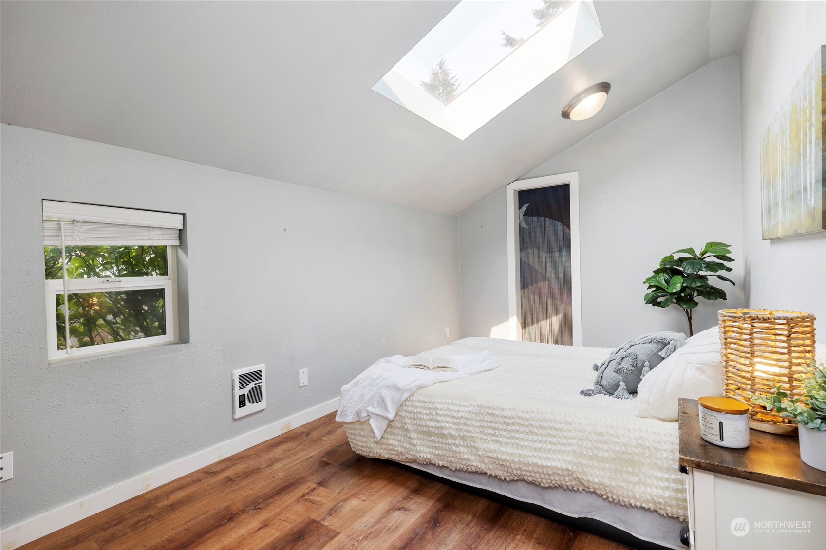 313 Earlington Avenue Southwest Renton, WA 98057 - Photo 15 of 35 a bedroom with a bed and window