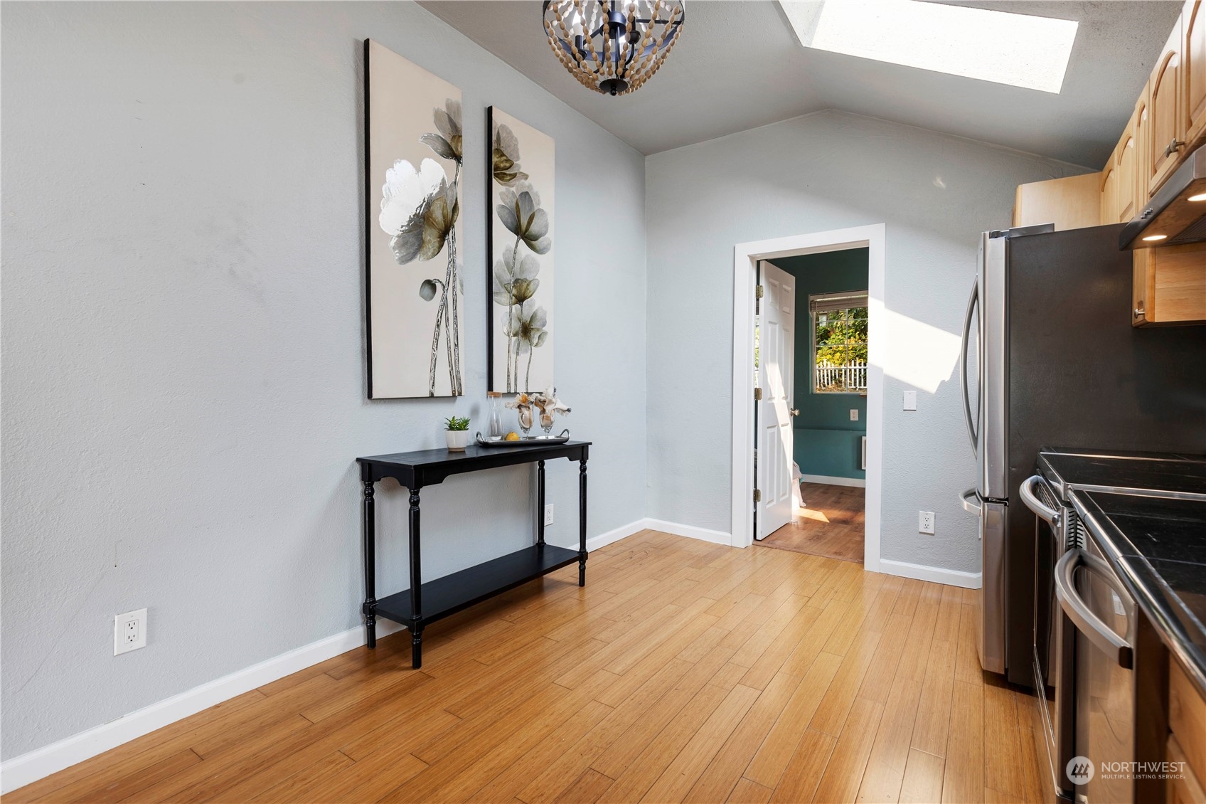 313 Earlington Avenue Southwest Renton, WA 98057 - Photo 19 of 35 a view of a hallway with wooden floor and staircase