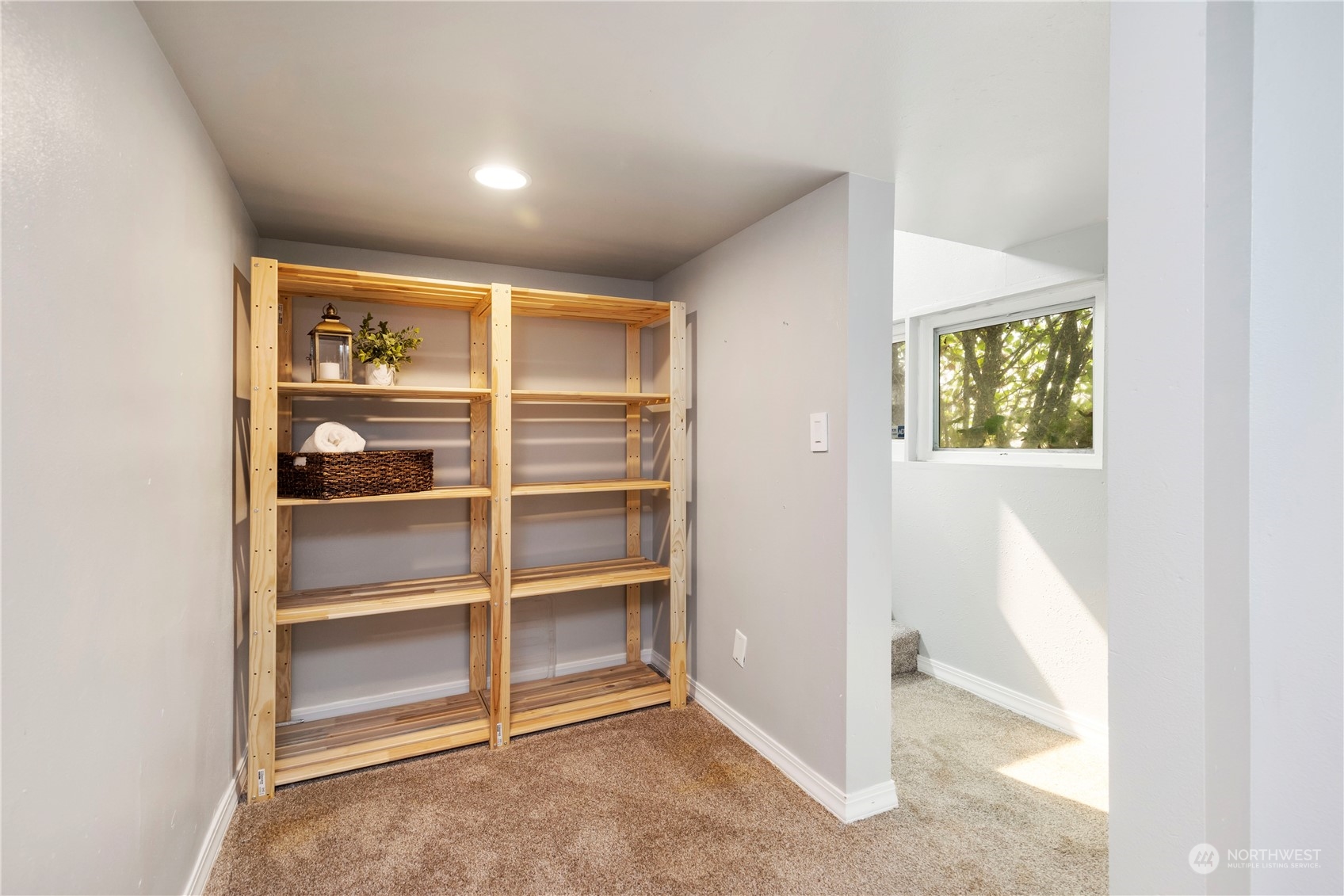 313 Earlington Avenue Southwest Renton, WA 98057 - Photo 23 of 35 a view of an empty room with a window