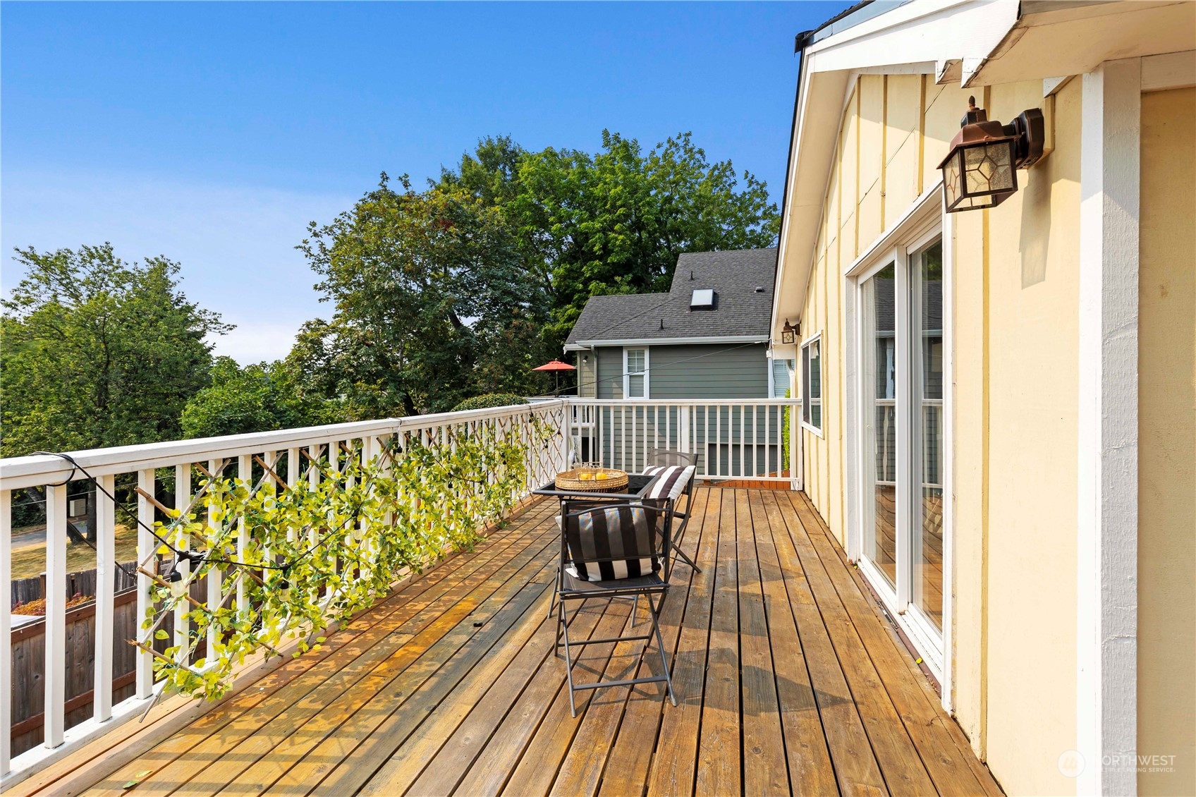 313 Earlington Avenue Southwest Renton, WA 98057 - Photo 27 of 35 a view of a balcony with chair and wooden floor