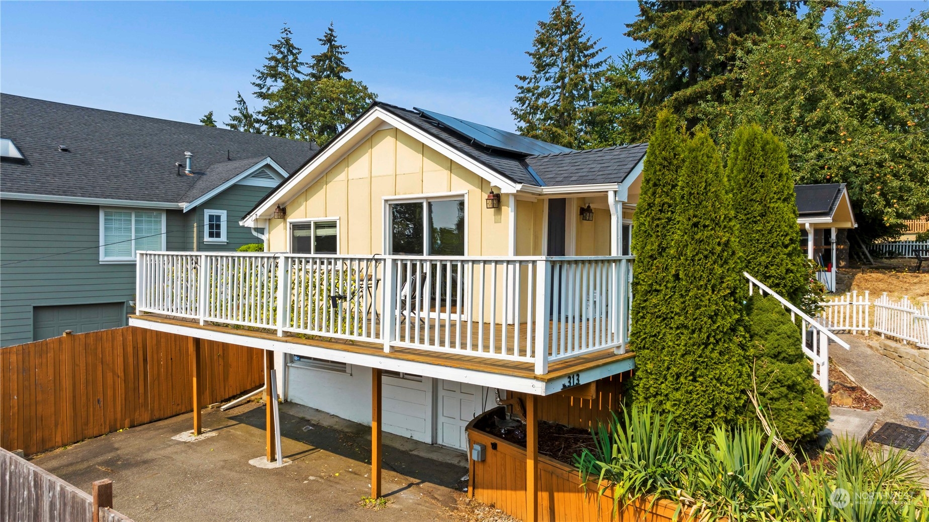313 Earlington Avenue Southwest Renton, WA 98057 - Photo 29 of 35 a view of a house with a deck