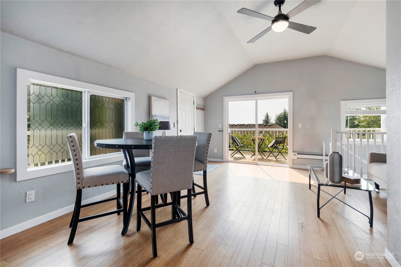313 Earlington Avenue Southwest Renton, WA 98057 - Photo 5 of 35 a view of a dining room with furniture window and wooden floor