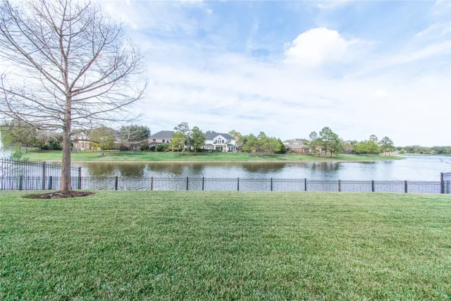 a view of a lake from a yard