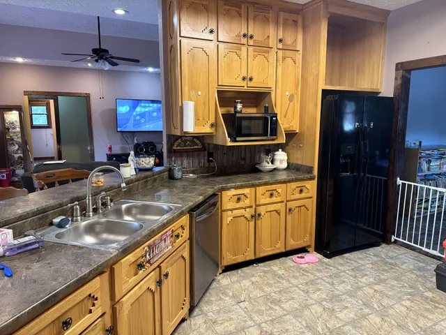 a dining table with chairs and a chandelier