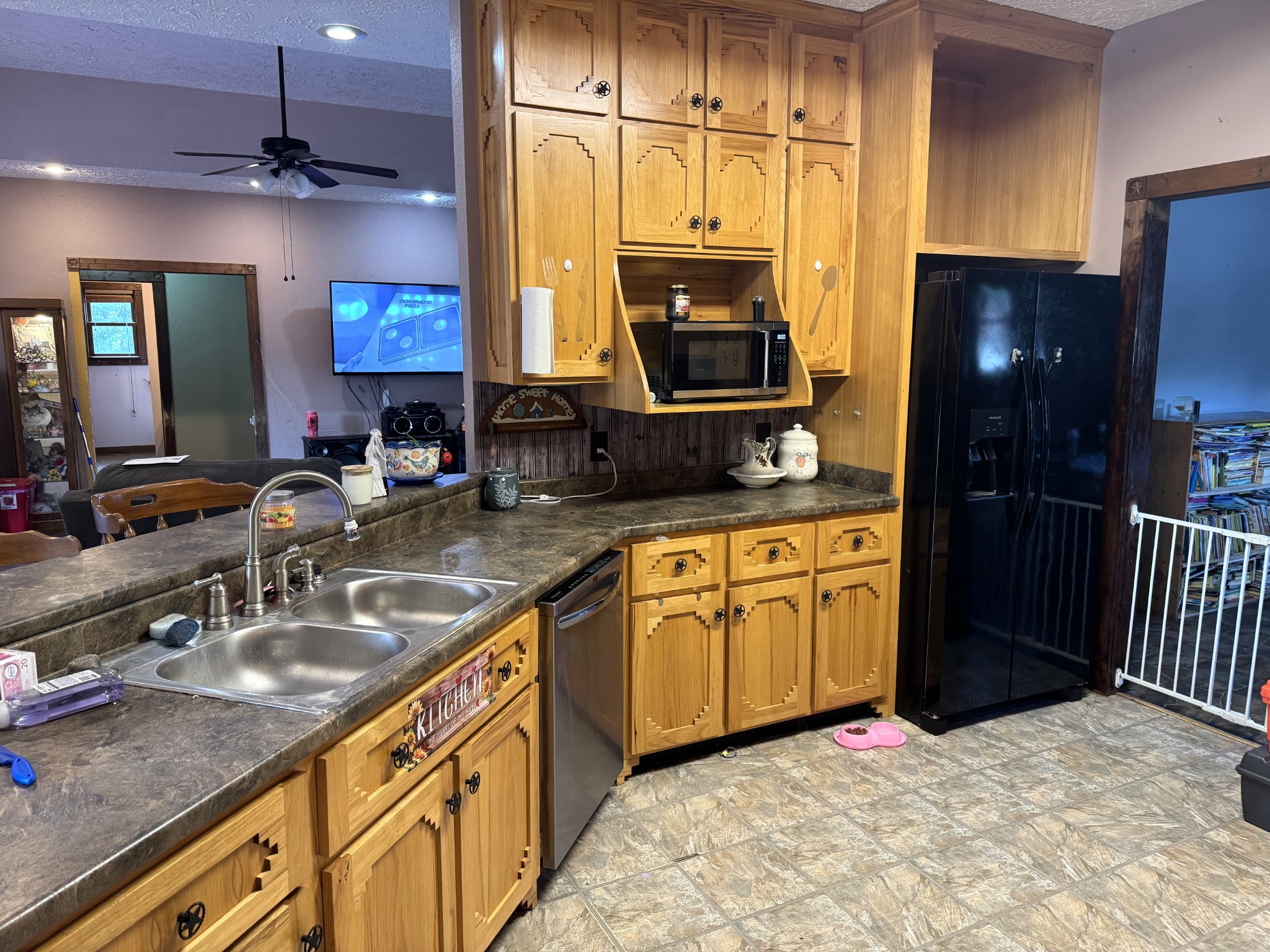 12466 Highway 108 Altamont, TN 37301 - Photo 10 of 40 a kitchen with stainless steel appliances granite countertop a sink a stove and a refrigerator
