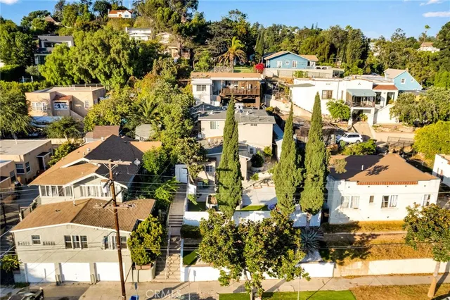 a view of residential houses with outdoor space