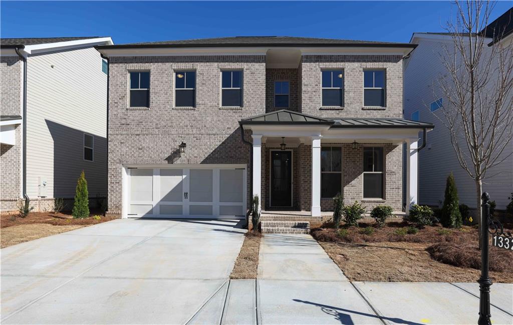 Welcome HOME to this stately Brick Family home with front covered porch!