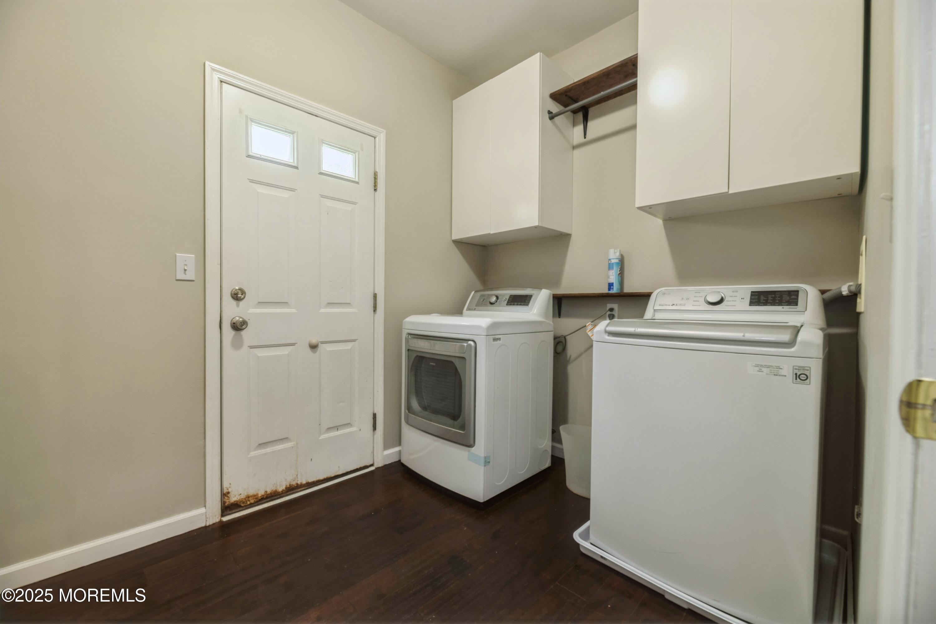11 Water Street Aberdeen, NJ 07747 - Photo 13 of 25 a utility room with dryer and washer