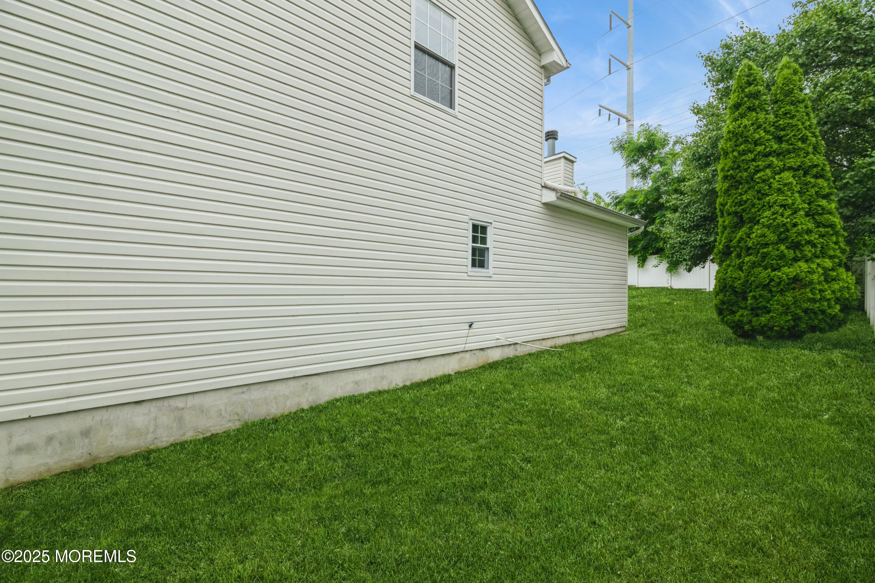 11 Water Street Aberdeen, NJ 07747 - Photo 24 of 25 a view of a backyard with a garden