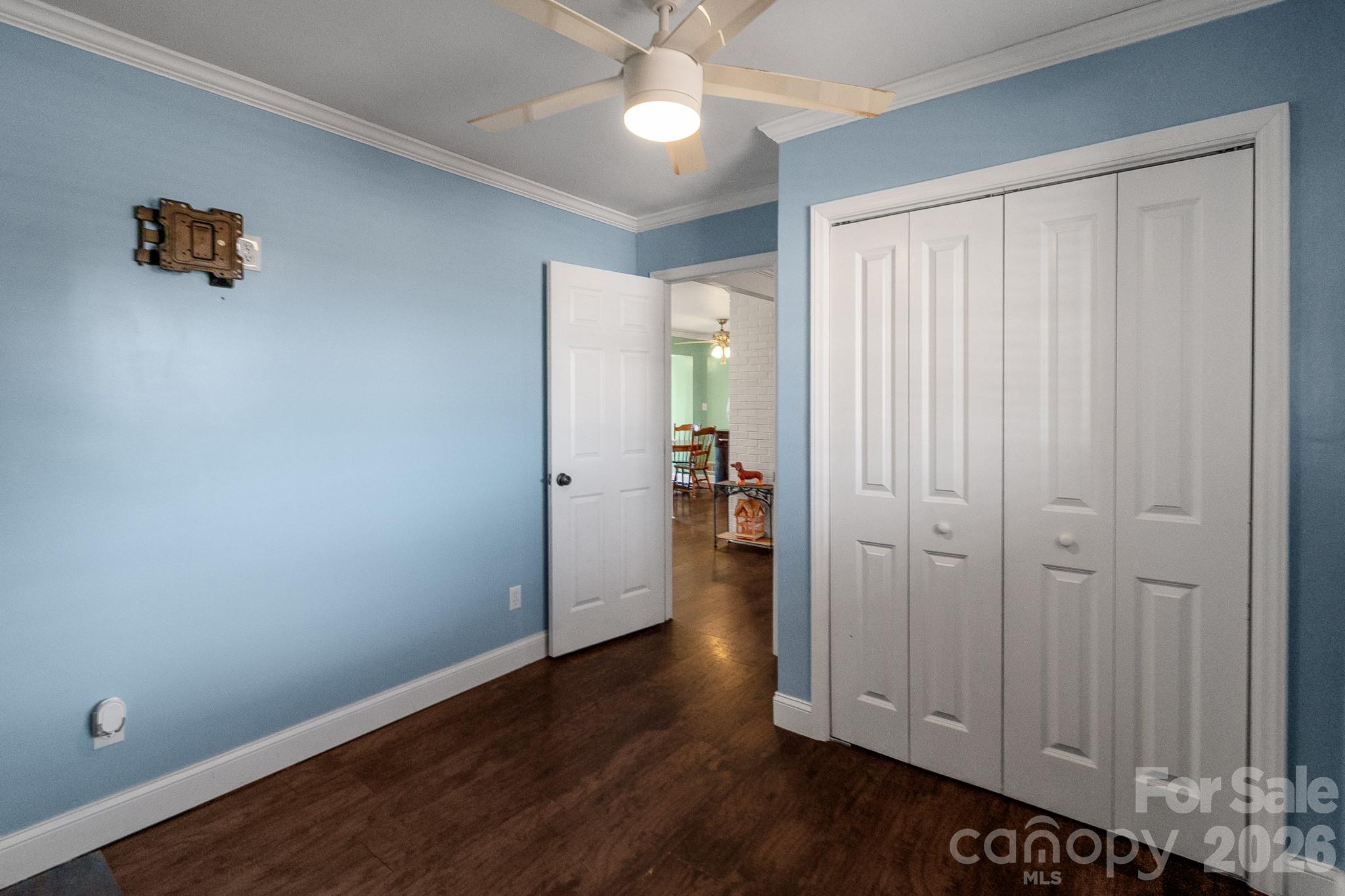 1099 South Potter Road Lancaster, SC 29720 - Photo 29 of 41 an empty room with wooden floor closet and windows