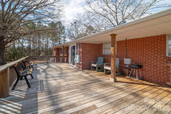 a view of a balcony with chairs