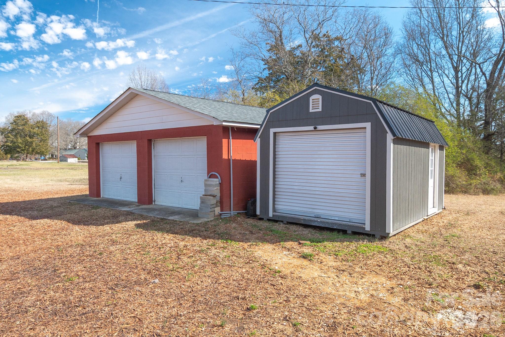 1099 South Potter Road Lancaster, SC 29720 - Photo 41 of 41 a view of a house with a yard and garage