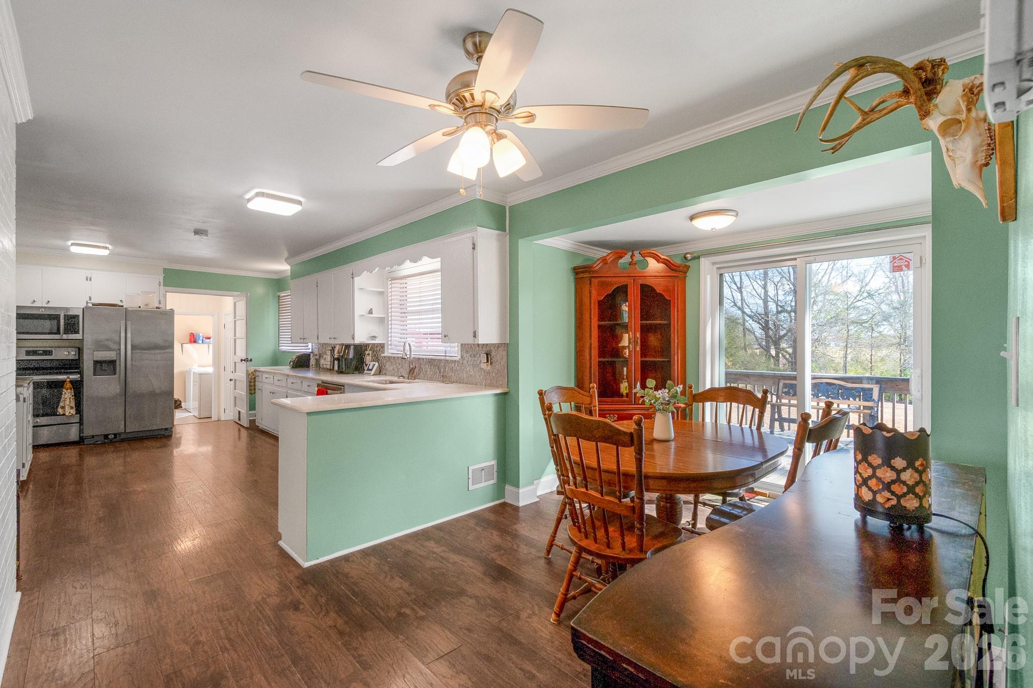 1099 South Potter Road Lancaster, SC 29720 - Photo 6 of 41 a dining room with furniture entryway and wooden floor