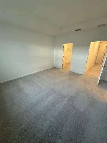a bathroom with a double vanity sink mirror and double