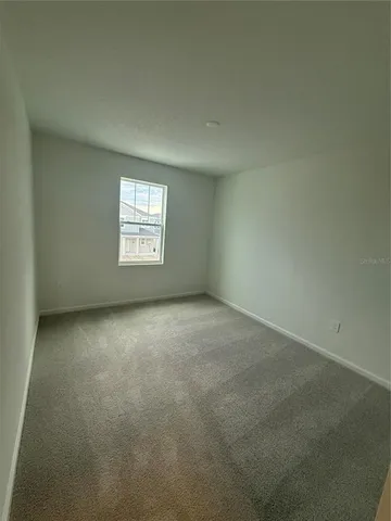 a bathroom with a granite countertop toilet a sink and bathtub