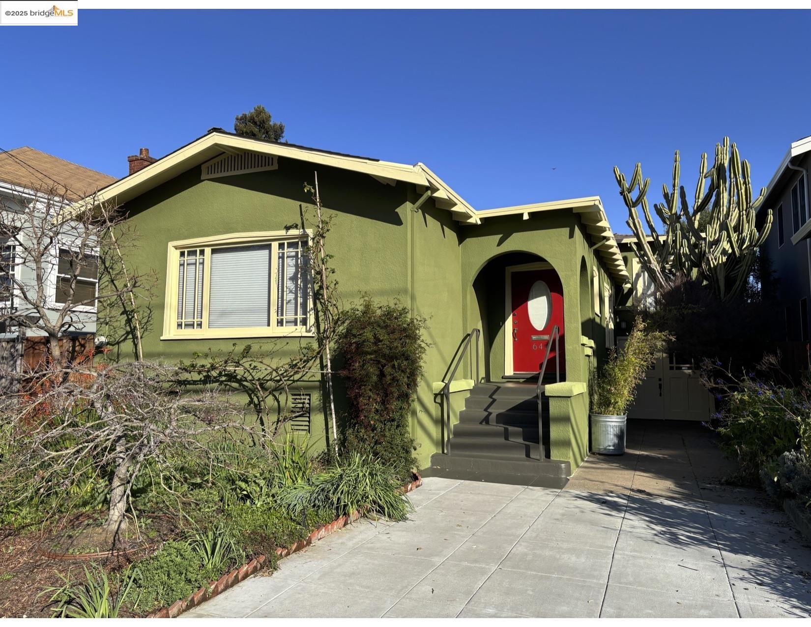 56th Street Oakland, CA 94609 - Photo 1 of 1 a front view of a house with garden