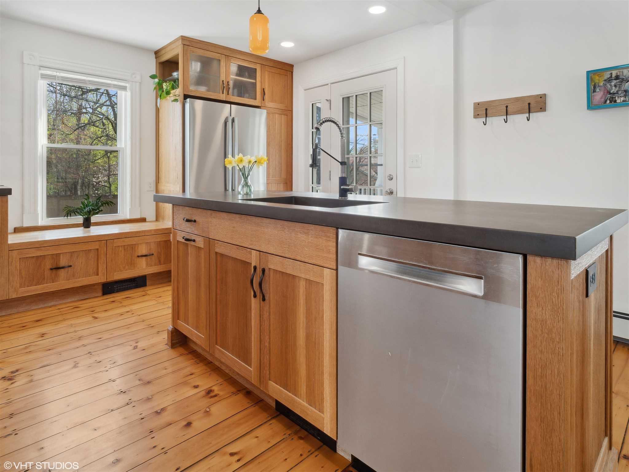 20 John Street Beacon, NY 12508 - Photo 16 of 36 a kitchen with stainless steel appliances a sink and a large window