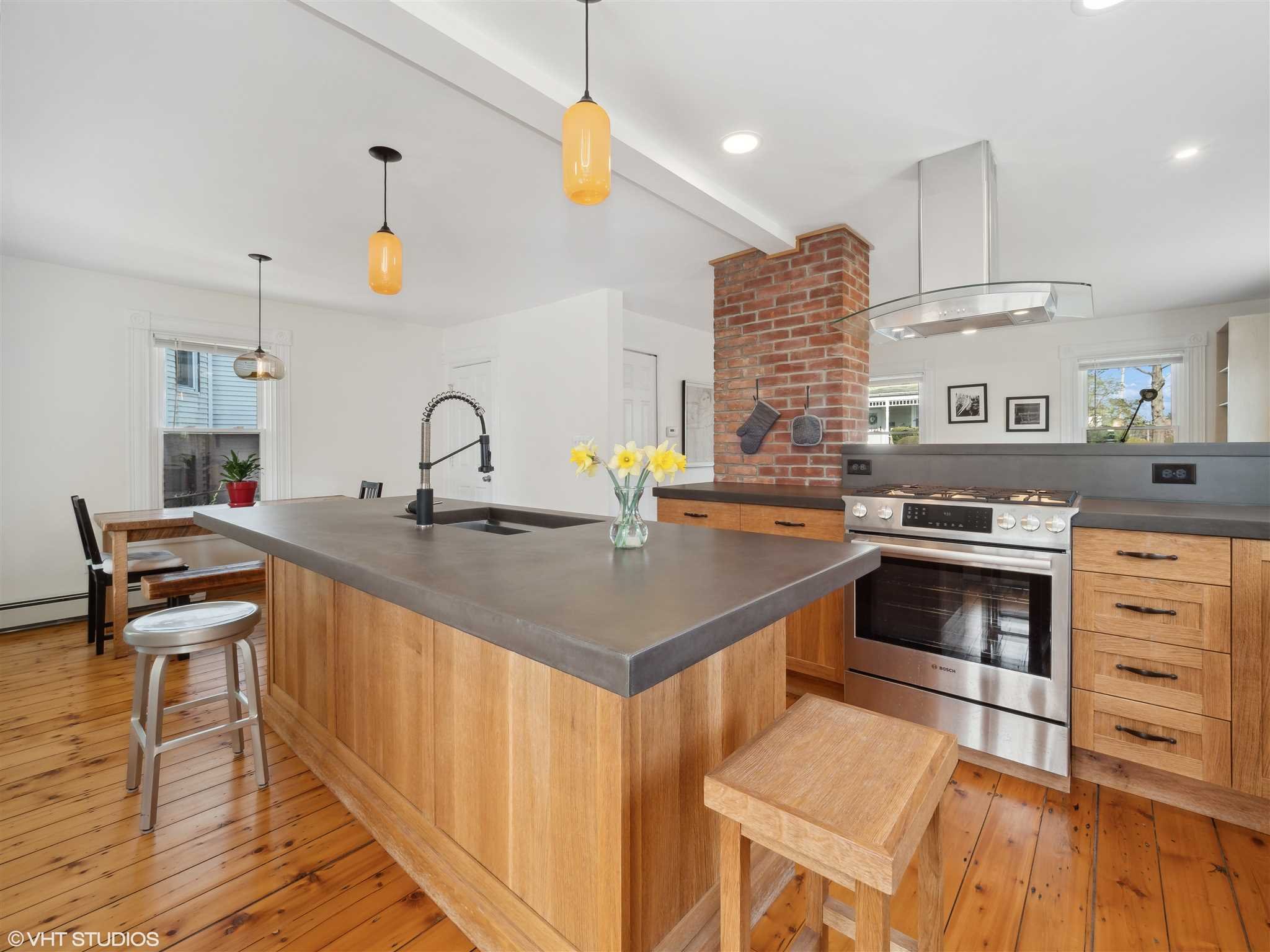20 John Street Beacon, NY 12508 - Photo 18 of 36 a kitchen with a stove cabinets and wooden floor